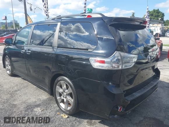 ✅ 2014 Toyota Sienna SE • VIN: 5TDXK3DC1ES446094 • Lot: 43616387. Listed on IAAI with 148,346 mi. Free auction sales archive from the USA and detailed vehicle history report at DreamBid. Image 3.