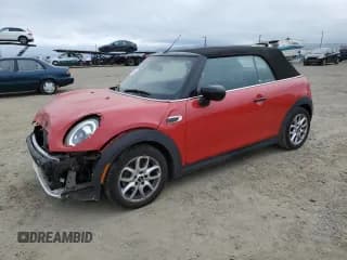 ✅ 2021 MINI Convertible Cooper • VIN: WMWWJ3C01M3M67417 • Лот: 53140225. Опубликован ранее на Copart с пробегом 26 673 миль. Бесплатный доступ к архиву аукционных продаж из США и подробный отчёт об истории автомобиля на DreamBid. Изображение 1.