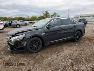 ✅ 2015 Ford Taurus SEL • VIN: 1FAHP2E85FG180106 • Лот: 89679025. Опубликован ранее на Copart с пробегом 128 068 миль. Бесплатный доступ к архиву аукционных продаж из США и подробный отчёт об истории автомобиля на DreamBid. Изображение 1.