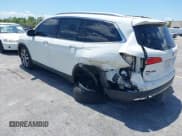 ✅ 2018 Honda Pilot Elite • VIN: 5FNYF6H00JB058623 • Lot: 42323415. Listed on IAAI with 102,015 mi. Free auction sales archive from the USA and detailed vehicle history report at DreamBid. Image 3.