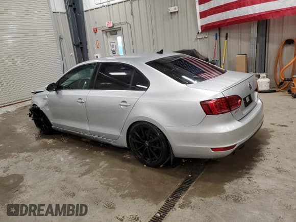 ✅ 2014 Volkswagen Jetta GLI • VIN: 3VW5T7AJ1EM302461 • Lot: 69777955. Listed on Copart with 123,303 mi. Free auction sales archive from the USA and detailed vehicle history report at DreamBid. Image 2.