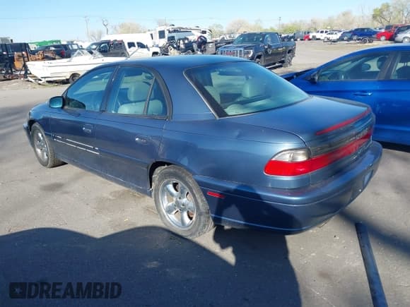 ✅ 1998 Cadillac Catera • VIN: W06VR52R0WR019027 • Lot: 42021502. Listed on IAAI with 124,903 mi. Free auction sales archive from the USA and detailed vehicle history report at DreamBid. Image 3.
