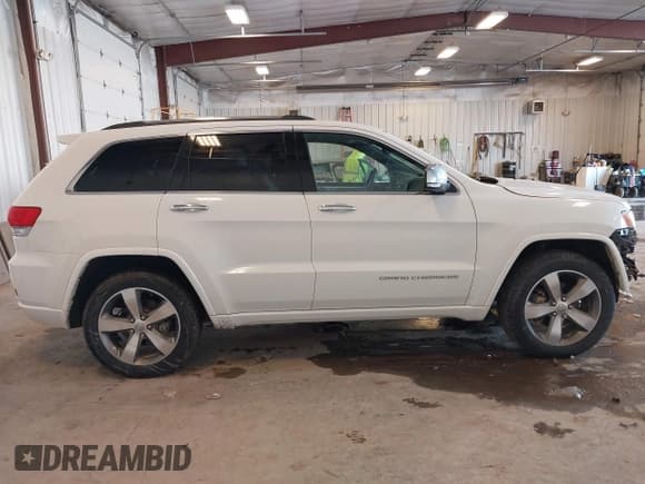 ✅ 2015 Jeep Grand Cherokee Overland • VIN: 1C4RJFCG6FC956820 • Lot: 41644453. Listed on IAAI with 149,339 mi. Free auction sales archive from the USA and detailed vehicle history report at DreamBid. Image 14.
