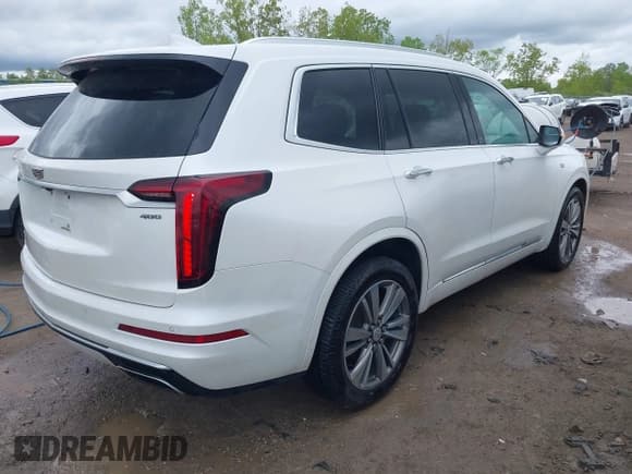 ✅ 2021 Cadillac XT6 Premium Luxury • VIN: 1GYKPDRS0MZ141453 • Лот: 42215954. Опубликован ранее на IAAI с пробегом 144 245 миль. Бесплатный доступ к архиву аукционных продаж из США и подробный отчёт об истории автомобиля на DreamBid. Изображение 4.