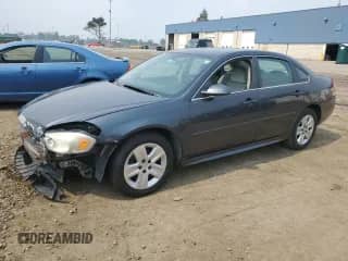 2010 Chevrolet Impala LS with VIN 2G1WA5EN1A1267493, listed as a Copart auction lot 67751185 with 176,872 mi miles and Salvage title. Bid and sale history available at DreamBid. Image 1.