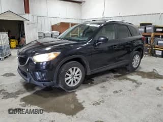 ✅ 2013 Mazda CX-5 Touring • VIN: JM3KE2CE1D0117757 • Lot: 92458135. Listed on Copart with 188,698 mi. Free auction sales archive from the USA and detailed vehicle history report at DreamBid. Image 1.