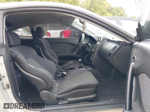 ✅ 2005 Hyundai Tiburon GS • VIN: KMHHM65D85U174335 • Лот: 39373771. Опубликован ранее на IAAI с пробегом 117 296 миль. Бесплатный доступ к архиву аукционных продаж из США и подробный отчёт об истории автомобиля на DreamBid. Изображение 5.