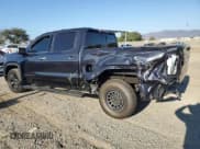 ✅ 2022 GMC Sierra 1500 Denali Ultimate • VIN: 1GTUUHEL9NZ521468 • Lot: 80138565. Wystawiony na Copart z przebiegiem 27 304 mil. Bezpłatny archiwum sprzedaży aukcyjnych z USA i szczegółowy raport historii pojazdu na DreamBid. Zdjęcie 2.