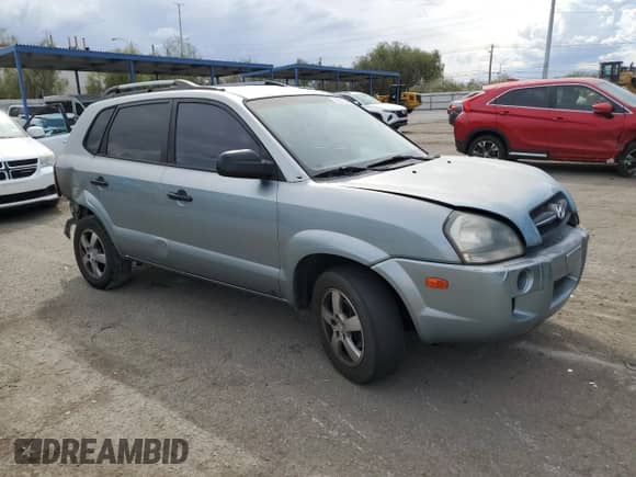 2005 Hyundai Tucson GL with VIN KM8JM12B95U080391, listed as a Copart auction lot 72551384 with 238,122 mi miles and Salvage title. Bid and sale history available at DreamBid. Image 4.
