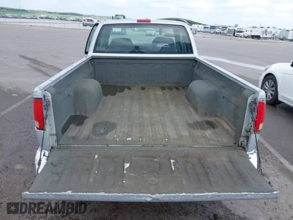 1997 Chevrolet S-10 LS with VIN 1GCCS19X0V8189366, listed as a IAAI auction lot 42729297 with 190,332 mi miles and . Bid and sale history available at DreamBid. Image 12.