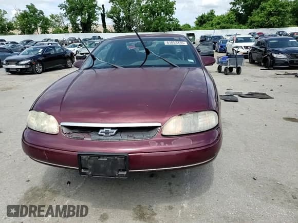 ✅ 1999 Chevrolet Monte Carlo LS • VIN: 2G1WW12M1X9225597 • Lot: 61053435. Listed on Copart with 161,466 mi. Free auction sales archive from the USA and detailed vehicle history report at DreamBid. Image 13.