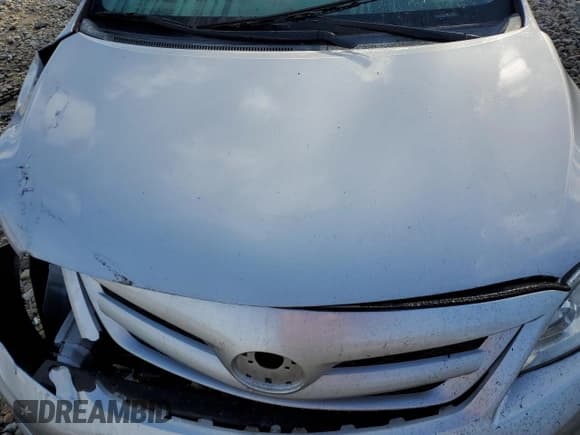 ✅ 2012 Toyota Corolla L • VIN: 2T1BU4EE8CC855810 • Lot: 75913044. Listed on Copart with 132,103 mi. Free auction sales archive from the USA and detailed vehicle history report at DreamBid. Image 12.