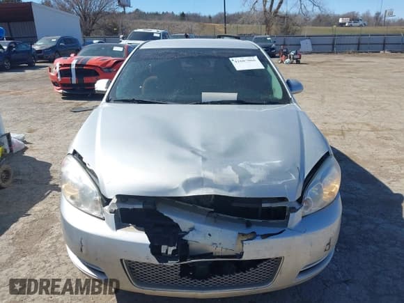 ✅ 2015 Chevrolet Impala LS • VIN: 2G1WA5E3XF1141168 • Lot: 41687066. Listed on IAAI with 210,413 mi. Free auction sales archive from the USA and detailed vehicle history report at DreamBid. Image 12.