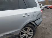 ✅ 2009 Hyundai Santa Fe SE • VIN: 5NMSH73E39H279698 • Lot: 43627061. Listed on IAAI with 185,779 mi. Free auction sales archive from the USA and detailed vehicle history report at DreamBid. Image 6.