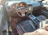 ✅ 2012 Dodge Challenger SXT Plus • VIN: 2C3CDYAG1CH148044 • Лот: 91060215. Опубликован ранее на Copart с пробегом 124 780 миль. Бесплатный доступ к архиву аукционных продаж из США и подробный отчёт об истории автомобиля на DreamBid. Изображение 8.