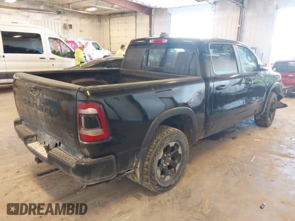 ✅ 2019 Ram 1500 Rebel • VIN: 1C6SRFLT7KN542362 • Lot: 43402661. Listed on IAAI with 132,846 mi. Free auction sales archive from the USA and detailed vehicle history report at DreamBid. Image 4.
