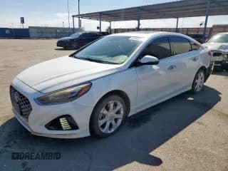 ✅ 2018 Hyundai Sonata SEL • VIN: 5NPE34AF4JH704228 • Lot: 81549555. Listed on Copart with 115,300 mi. Free auction sales archive from the USA and detailed vehicle history report at DreamBid. Image 1.