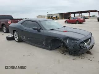 ✅ 2013 Dodge Challenger R/T Plus • VIN: 2C3CDYBT6DH729097 • Lot: 52572444. Wystawiony na Copart z przebiegiem 156 221 mil. Bezpłatny archiwum sprzedaży aukcyjnych z USA i szczegółowy raport historii pojazdu na DreamBid. Zdjęcie 4.