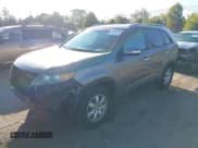 ✅ 2013 Kia Sorento LX • VIN: 5XYKT4A24DG403891 • Lot: 43115661. Listed on IAAI with 148,626 mi. Free auction sales archive from the USA and detailed vehicle history report at DreamBid. Image 2.