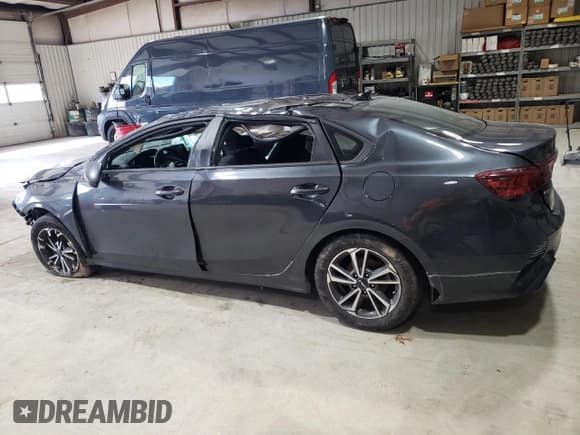 ✅ 2023 Kia Forte LXS • VIN: 3KPF24AD0PE533383 • Лот: 91154545. Опубликован ранее на Copart с пробегом 26 087 миль. Бесплатный доступ к архиву аукционных продаж из США и подробный отчёт об истории автомобиля на DreamBid. Изображение 2.