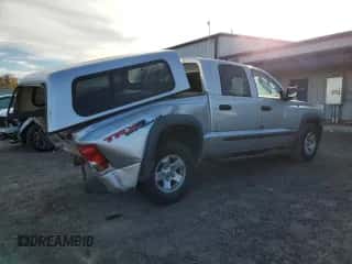 2008 Dodge Dakota z VIN 1D7HW78N78S598393, wystawiony jako Copart lot #77828614 z przebiegiem 173 080 mil mil oraz Nie do naprawy • Non repairable. Historia ofert i sprzedaży dostępna na DreamBid. Obrazek 3.