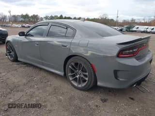 ✅ 2023 Dodge Charger Scat Pack • VIN: 2C3CDXGJ3PH699434 • Lot: 43684080. Listed on IAAI with 7,649 mi. Free auction sales archive from the USA and detailed vehicle history report at DreamBid. Image 3.