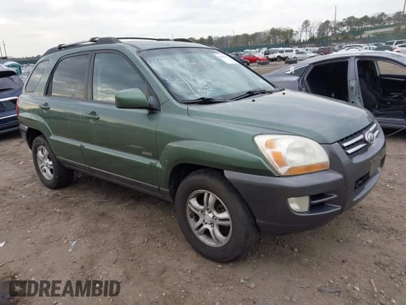 ✅ 2007 Kia Sportage LX • VIN: KNDJE723277359843 • Lot: 41903253. Listed on IAAI with 233,037 mi. Free auction sales archive from the USA and detailed vehicle history report at DreamBid. Image 1.