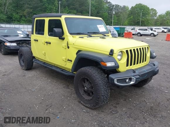 ✅ 2023 Jeep Gladiator Sport S • VIN: 1C6HJTAG8PL535820 • Лот: 42061745. Опубликован ранее на IAAI с пробегом 62 000 миль. Бесплатный доступ к архиву аукционных продаж из США и подробный отчёт об истории автомобиля на DreamBid. Изображение 1.