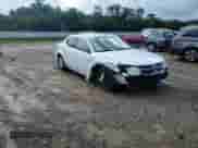 2013 Dodge Avenger SE z VIN 1C3CDZAB0DN592146, wystawiony jako Copart lot #82248105 z przebiegiem 219 706 mil mil oraz Szkoda całkowita • Salvage title. Historia ofert i sprzedaży dostępna na DreamBid. Obrazek 14.