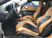 ✅ 2018 Ferrari 488 • VIN: ZFF80AMA6J0231516 • Лот: 79886954. Опубликован ранее на Copart с пробегом Не указан. Бесплатный доступ к архиву аукционных продаж из США и подробный отчёт об истории автомобиля на DreamBid. Изображение 7.