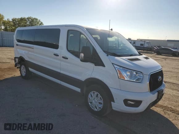 ✅ 2022 Ford Transit Passenger XLT • VIN: 1FBAX2Y86NKA83293 • Lot: 85354455. Listed on Copart with 77,104 mi. Free auction sales archive from the USA and detailed vehicle history report at DreamBid. Image 4.