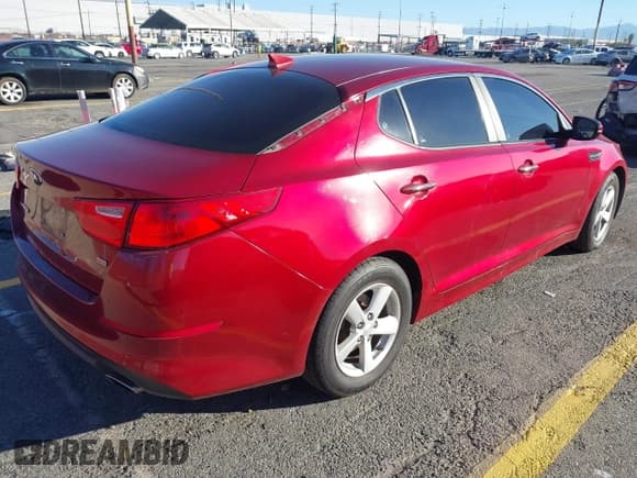 ✅ 2014 Kia Optima LX • VIN: 5XXGM4A70EG264900 • Lot: 43834879. Listed on IAAI with 81,131 mi. Free auction sales archive from the USA and detailed vehicle history report at DreamBid. Image 4.