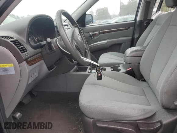 ✅ 2012 Hyundai Santa Fe GLS • VIN: 5XYZG3AB7CG124818 • Lot: 79463594. Listed on Copart with 186,656 mi. Free auction sales archive from the USA and detailed vehicle history report at DreamBid. Image 7.