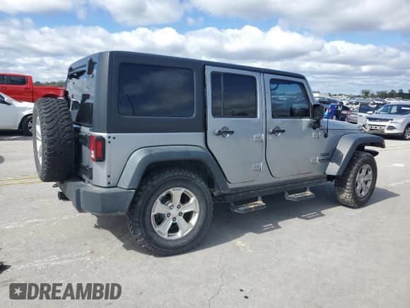 ✅ 2017 Jeep Wrangler Unlimited Sport • VIN: 1C4BJWDG3HL690515 • Lot: 82348645. Listed on Copart with 99,424 mi. Free auction sales archive from the USA and detailed vehicle history report at DreamBid. Image 3.