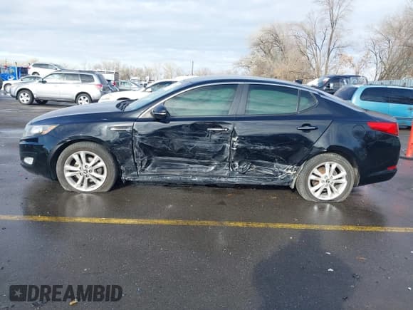 ✅ 2013 Kia Optima EX • VIN: 5XXGN4A72DG255630 • Lot: 41209455. Listed on IAAI with 178,064 mi. Free auction sales archive from the USA and detailed vehicle history report at DreamBid. Image 14.