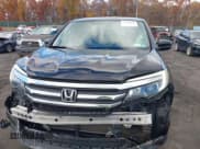 ✅ 2017 Honda Pilot EX-L • VIN: 5FNYF6H58HB037329 • Lot: 43630810. Listed on IAAI with 107,157 mi. Free auction sales archive from the USA and detailed vehicle history report at DreamBid. Image 6.