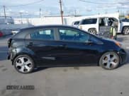 ✅ 2013 Kia Rio EX • VIN: KNADN5A31D6136842 • Lot: 43757042. Listed on IAAI with 107,054 mi. Free auction sales archive from the USA and detailed vehicle history report at DreamBid. Image 14.