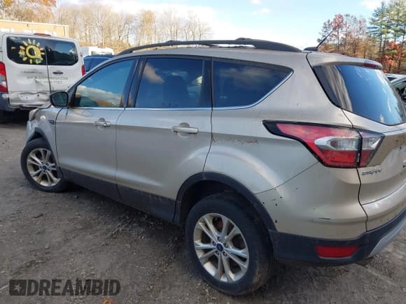 ✅ 2017 Ford Escape SE • VIN: 1FMCU9GD9HUC58130 • Lot: 43610717. Listed on IAAI with 147,188 mi. Free auction sales archive from the USA and detailed vehicle history report at DreamBid. Image 14.
