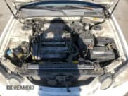 ✅ 2003 Kia Optima LX • VIN: KNAGD128X35205020 • Лот: 76521374. Опубликован ранее на Copart с пробегом 242 323 миль. Бесплатный доступ к архиву аукционных продаж из США и подробный отчёт об истории автомобиля на DreamBid. Изображение 11.