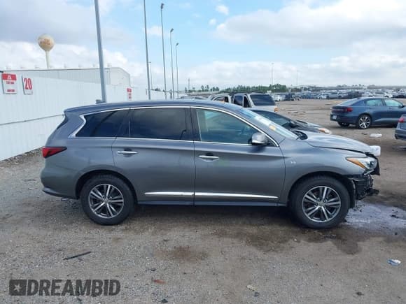 ✅ 2020 Infiniti QX60 Luxe • VIN: 5N1DL0MNXLC523376 • Lot: 41189601. Wystawiony na IAAI z przebiegiem 47 655 mil. Bezpłatny archiwum sprzedaży aukcyjnych z USA i szczegółowy raport historii pojazdu na DreamBid. Zdjęcie 14.