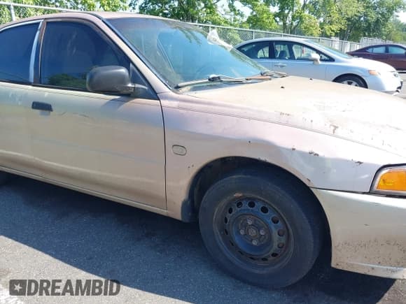 ✅ 2000 Mitsubishi Mirage DE • VIN: JA3AY26C6YU055291 • Лот: 42582994. Опубликован ранее на IAAI с пробегом 110 621 миль. Бесплатный доступ к архиву аукционных продаж из США и подробный отчёт об истории автомобиля на DreamBid. Изображение 14.