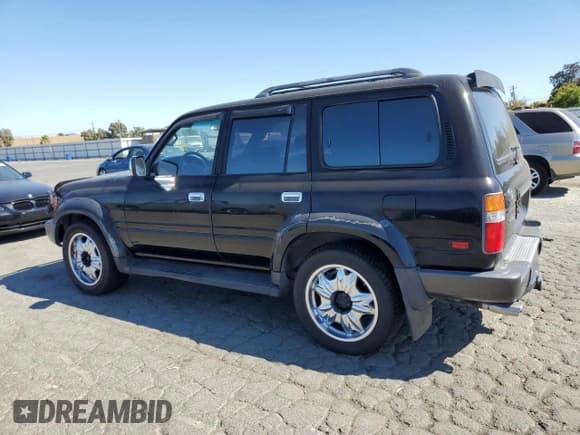 ✅ 1996 Toyota Land Cruiser • VIN: JT3HJ85JXT0123801 • Лот: 69316865. Опубликован ранее на Copart с пробегом 220 794 миль. Бесплатный доступ к архиву аукционных продаж из США и подробный отчёт об истории автомобиля на DreamBid. Изображение 2.