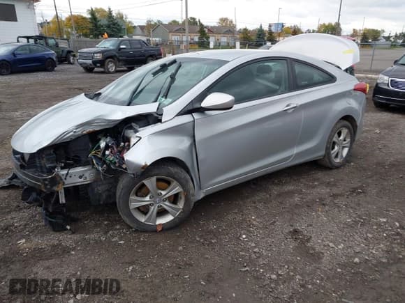 ✅ 2013 Hyundai Elantra GS • VIN: KMHDH6AE0DU011985 • Lot: 43590254. Listed on IAAI with 101,991 mi. Free auction sales archive from the USA and detailed vehicle history report at DreamBid. Image 2.