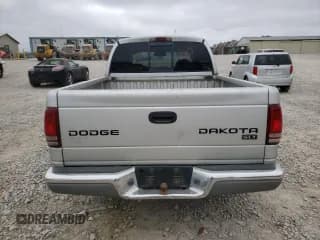 ✅ 2003 Dodge Dakota SLT • VIN: 1D7HL48X13S151334 • Lot: 82016764. Wystawiony na Copart z przebiegiem 216 281 mil. Bezpłatny archiwum sprzedaży aukcyjnych z USA i szczegółowy raport historii pojazdu na DreamBid. Zdjęcie 6.