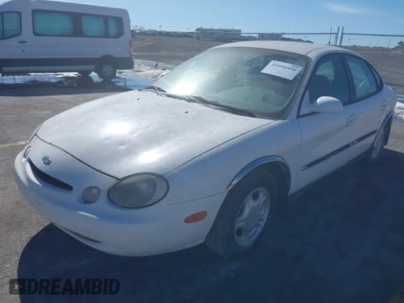 ✅ 1996 Ford Taurus GL • VIN: 1FALP52U0TG128147 • Lot: 41604450. Listed on IAAI with 152,949 mi. Free auction sales archive from the USA and detailed vehicle history report at DreamBid. Image 2.