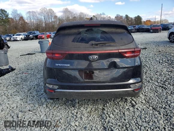 ✅ 2020 Kia Sportage LX • VIN: KNDPM3AC1L7834402 • Lot: 92320865. Wystawiony na Copart z przebiegiem 76 652 mil. Bezpłatny archiwum sprzedaży aukcyjnych z USA i szczegółowy raport historii pojazdu na DreamBid. Zdjęcie 6.