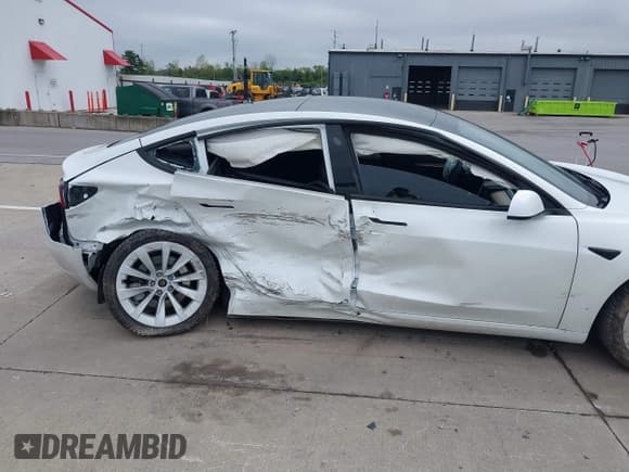 ✅ 2023 Tesla Model 3 • VIN: 5YJ3E1EA3PF563240 • Lot: 42190104. Listed on IAAI with 32,596 mi. Free auction sales archive from the USA and detailed vehicle history report at DreamBid. Image 6.