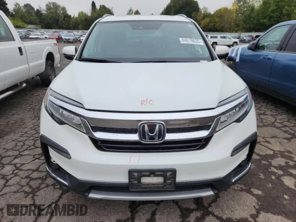 ✅ 2020 Honda Pilot Elite • VIN: 5FNYF6H03LB045142 • Lot: 84619835. Wystawiony na Copart z przebiegiem 46 747 mil. Bezpłatny archiwum sprzedaży aukcyjnych z USA i szczegółowy raport historii pojazdu na DreamBid. Zdjęcie 5.