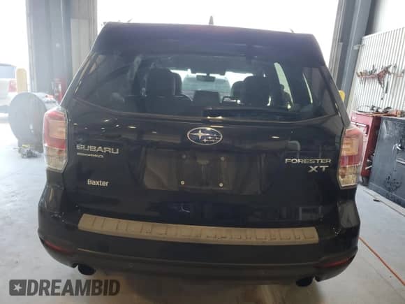 2018 Subaru Forester Touring с VIN JF2SJGWC7JH543947, выставлен на аукционе Copart как лот 69349005 с пробегом 61 575 миль миль и Списание • Salvage title. История ставок и продаж доступна на DreamBid. Изображение 6.