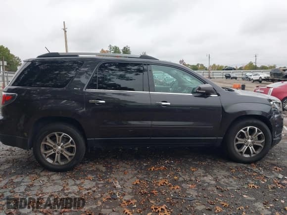 ✅ 2016 GMC Acadia SLT • VIN: 1GKKRRKD9GJ146781 • Lot: 43548079. Listed on IAAI with 148,049 mi. Free auction sales archive from the USA and detailed vehicle history report at DreamBid. Image 13.